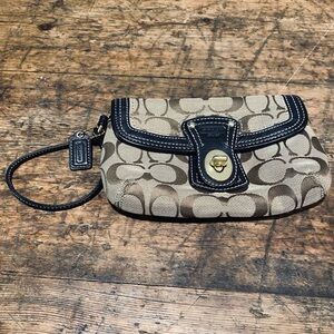 Coach wristlet tan and black